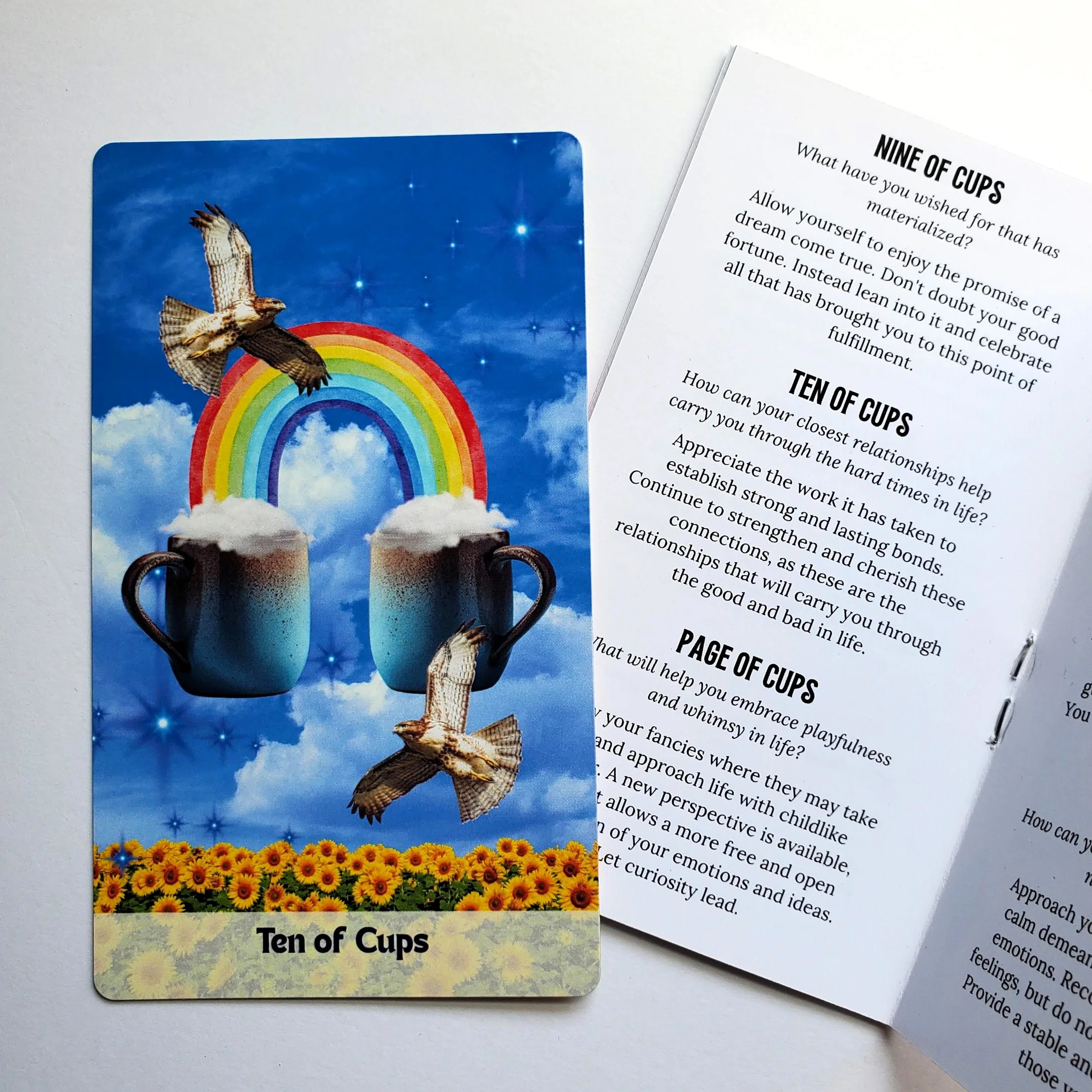 How Did I Get Here Tarot guidebook entry and Ten of Cups card — pop art collage indie tarot deck by S.G. Stasi Designs