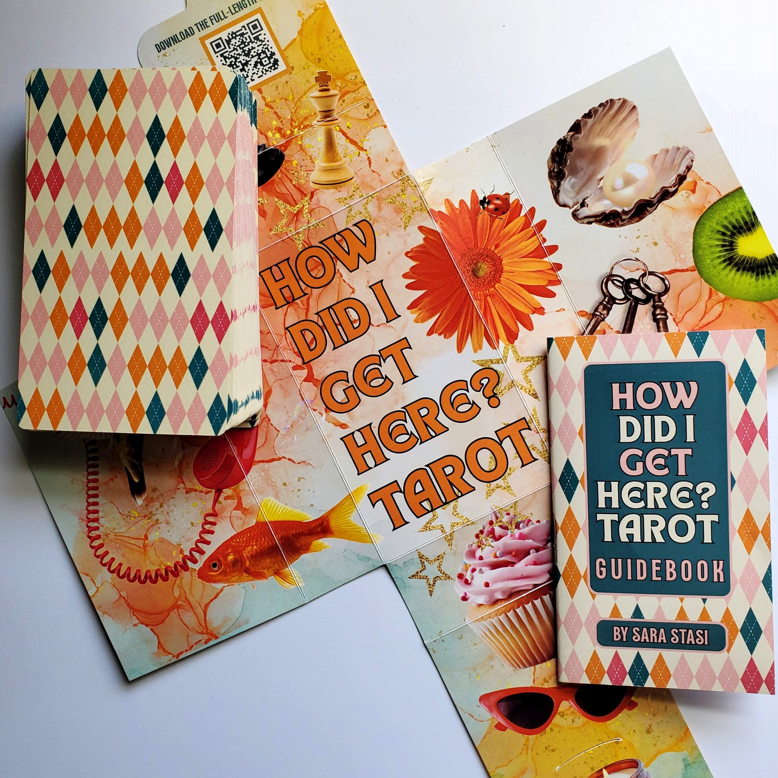 How Did I Get Here Tarot cards and guidebook on top of open hook box showing deck artwork — pop art collage indie tarot deck by S.G. Stasi Designs