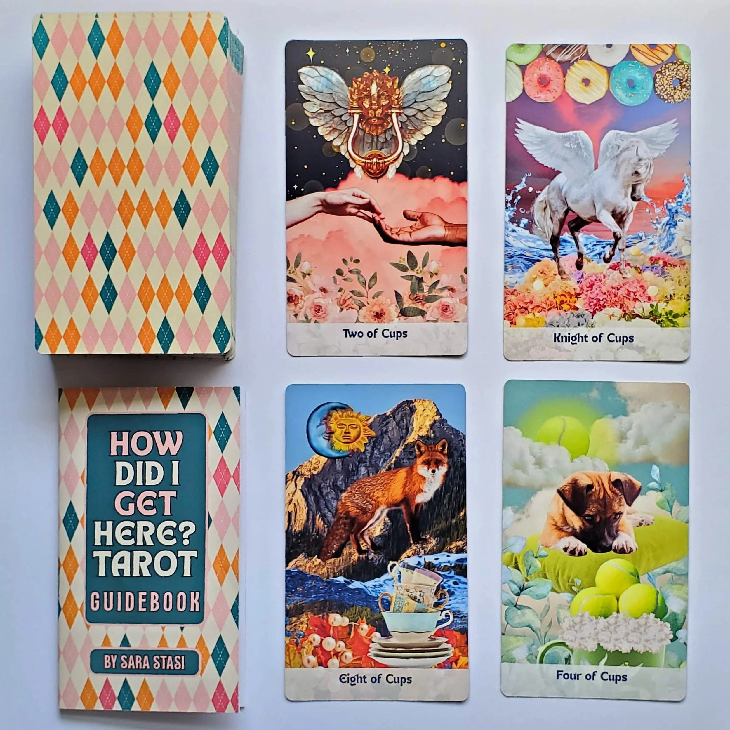 How Did I Get Here Tarot box, guidebook, and sample and cards displayed — pop art collage indie tarot deck by S.G. Stasi Designs