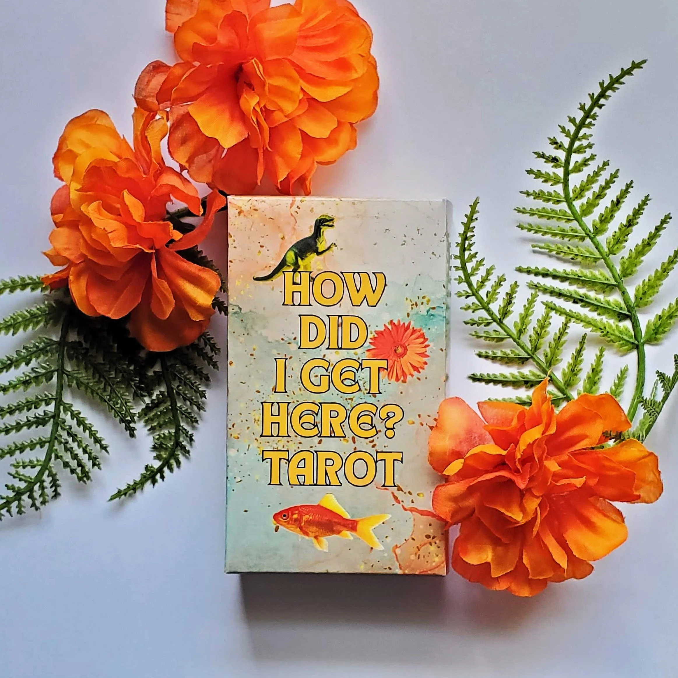 How Did I Get Here Tarot box with orange flowers and ferns — pop art collage indie tarot deck by S.G. Stasi Designs