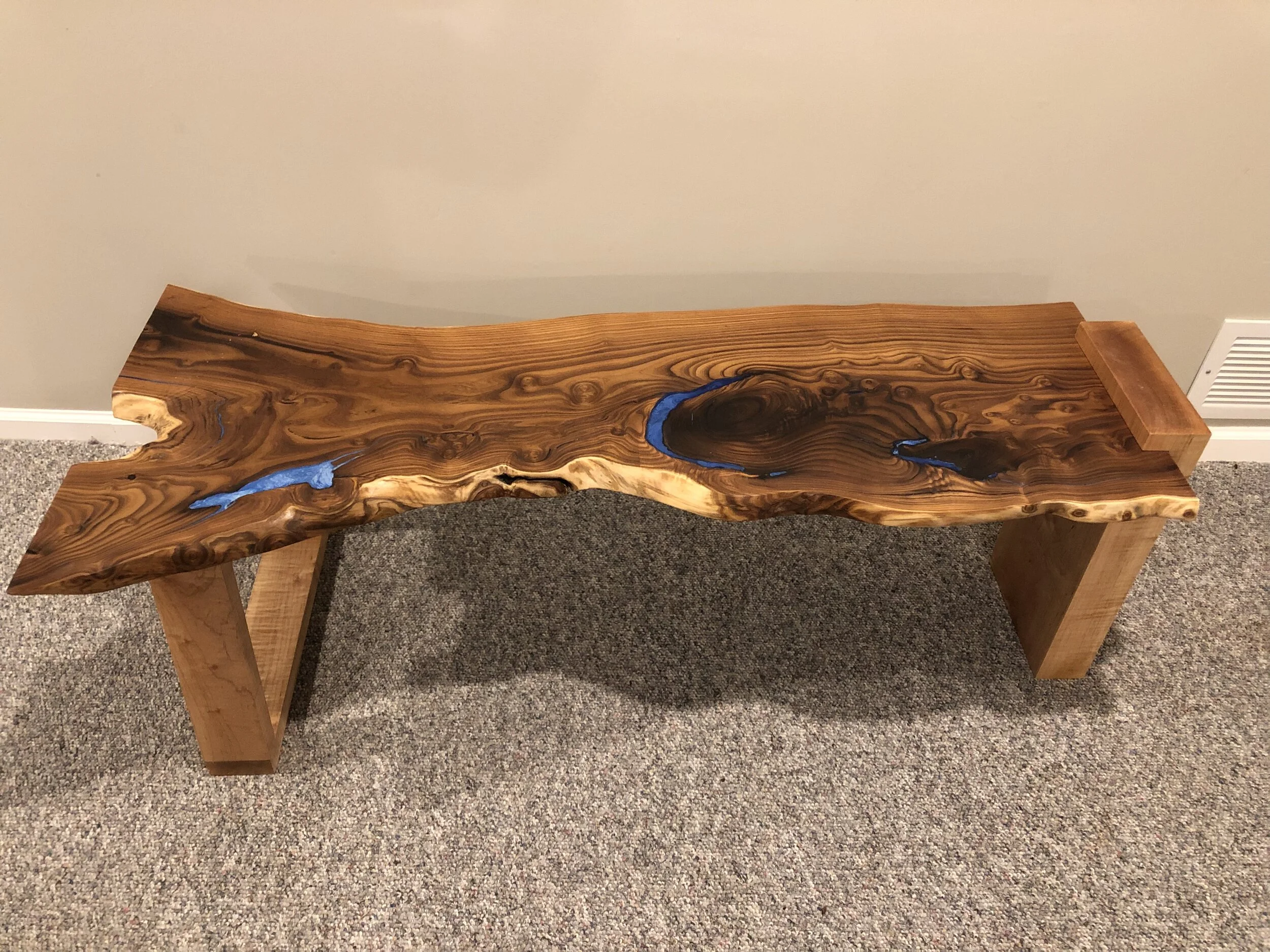 Russian olive wood coffee table with blue resin accents
