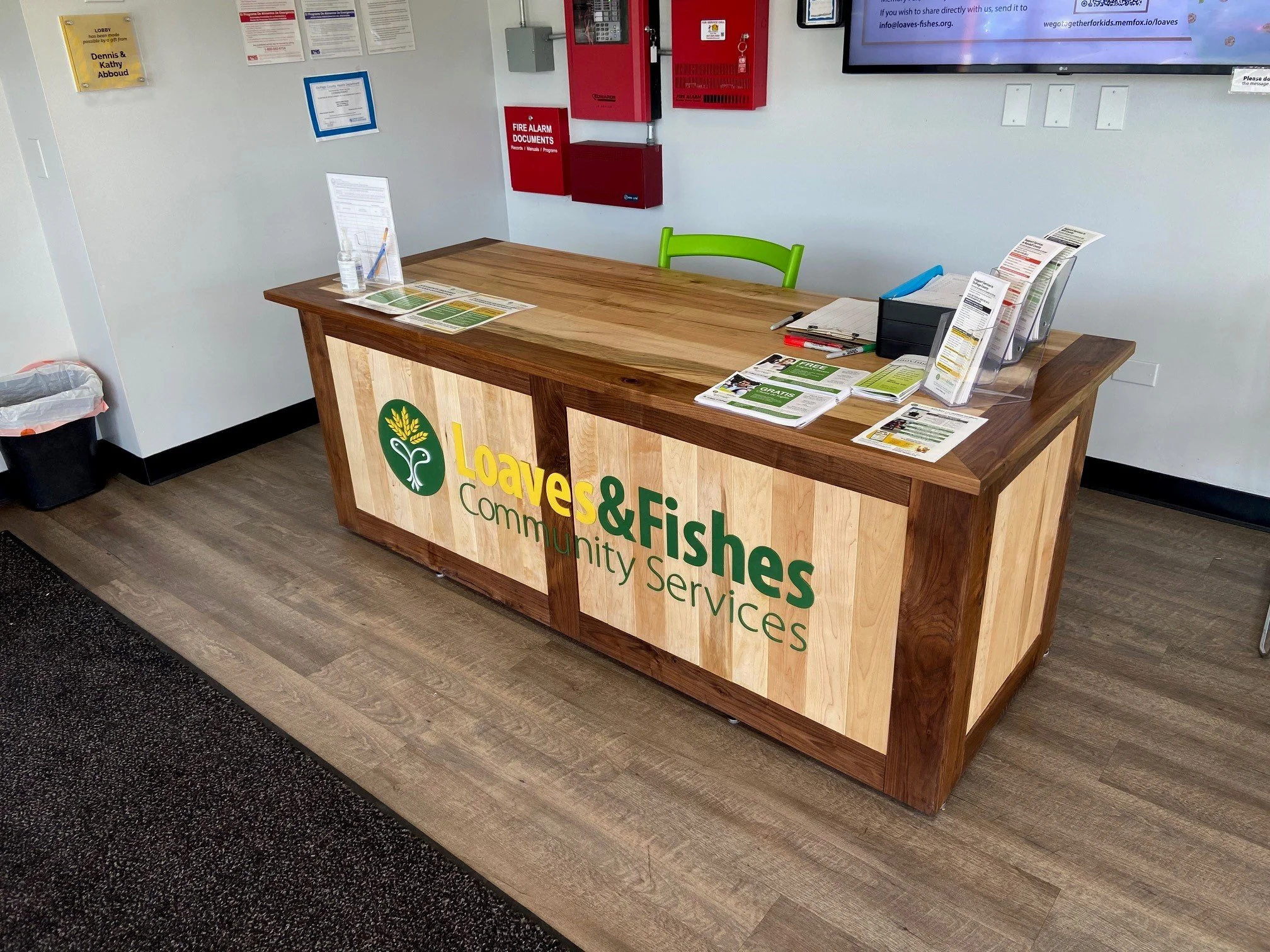 Intake desk donated to Loaves & Fishes, roughly 72" long. Dark wood is walnut, light wood is maple.