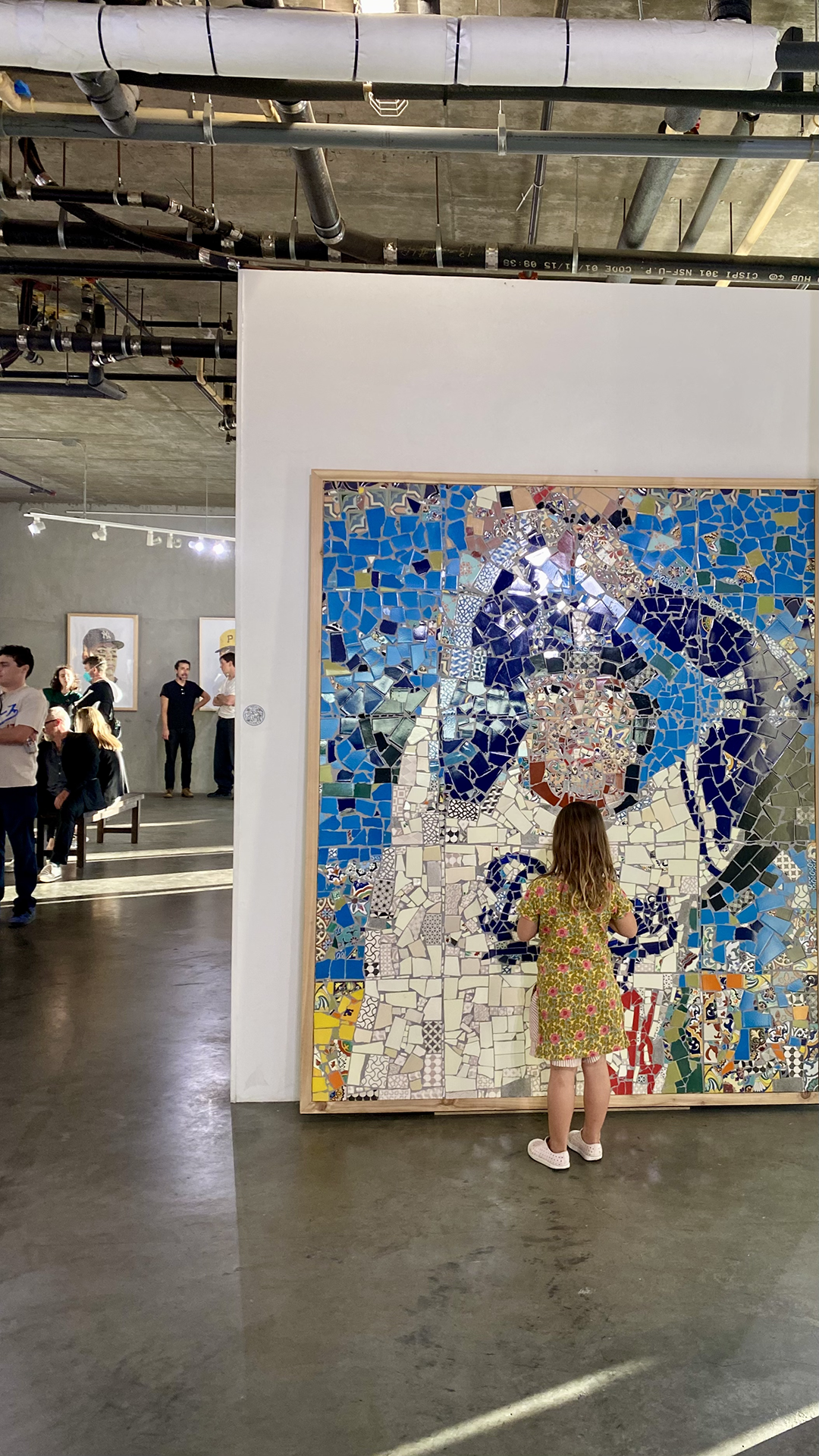 fernando mosaic with little girl.png