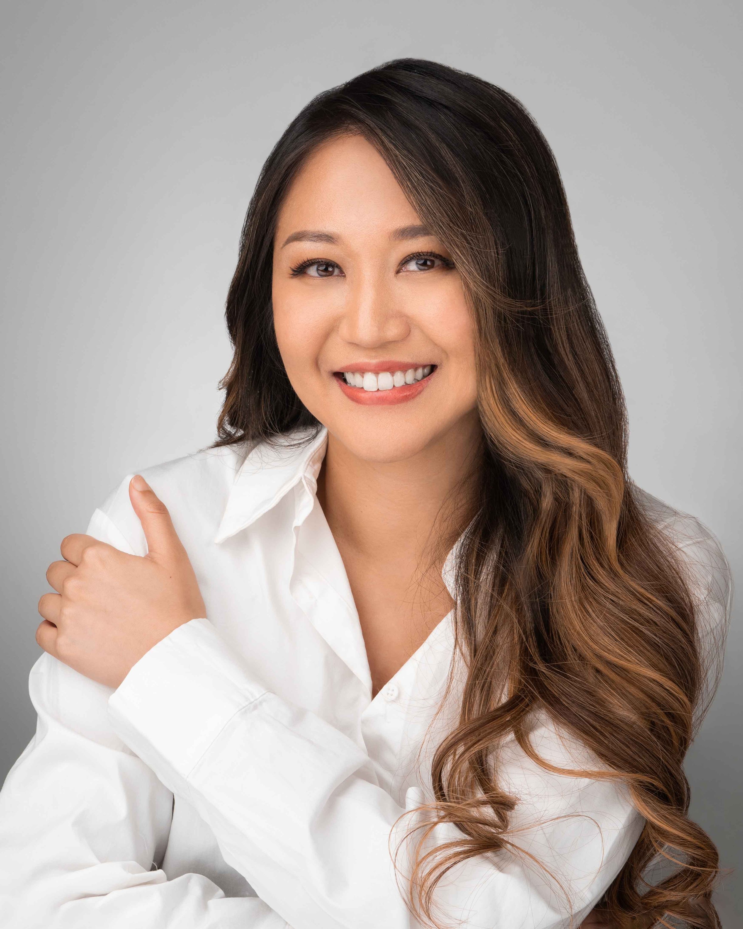 corporate headshot in Singapore of Anna Haotanto, during a professional photo shoot at a photo studio near you