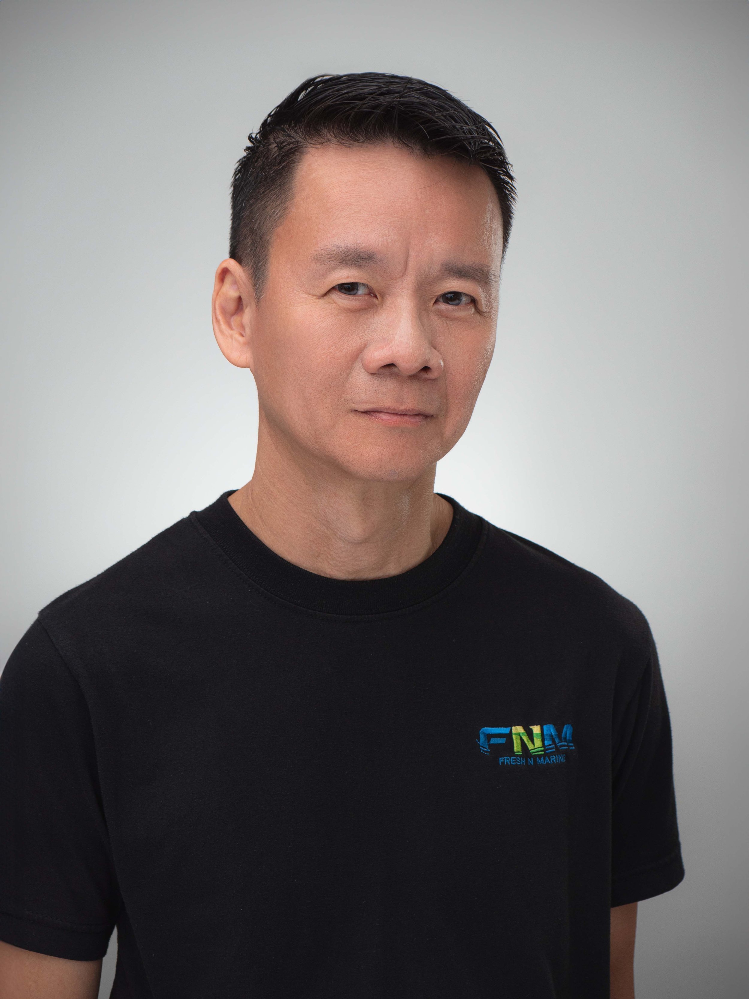 corporate headshot in Singapore of Edmund Lim, Fresh n Marine, during a professional photo shoot at a photo studio near you