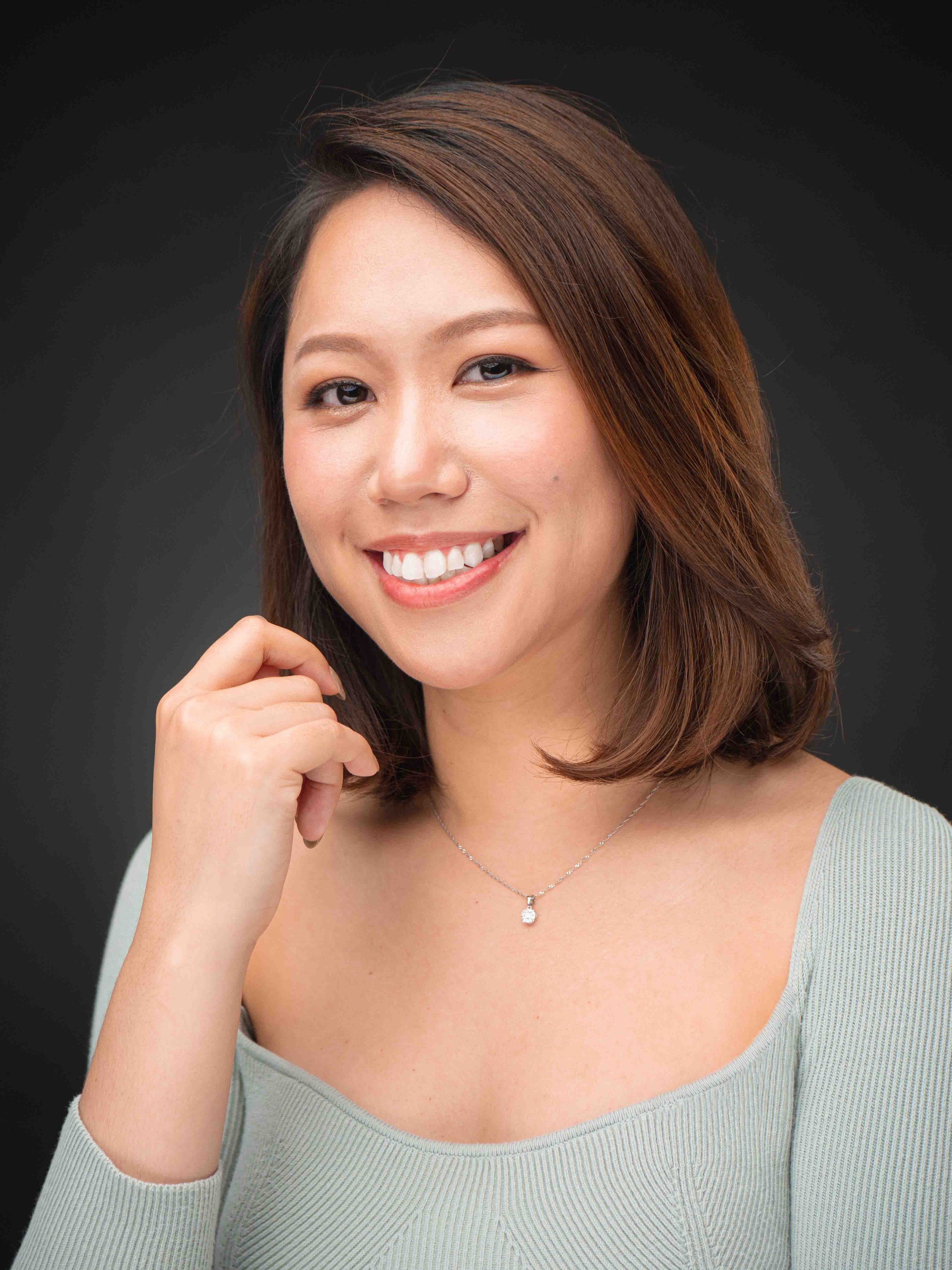 corporate headshot in Singapore of Vanessa Yeo, Jobstreet, during a professional photo shoot at a photo studio near you