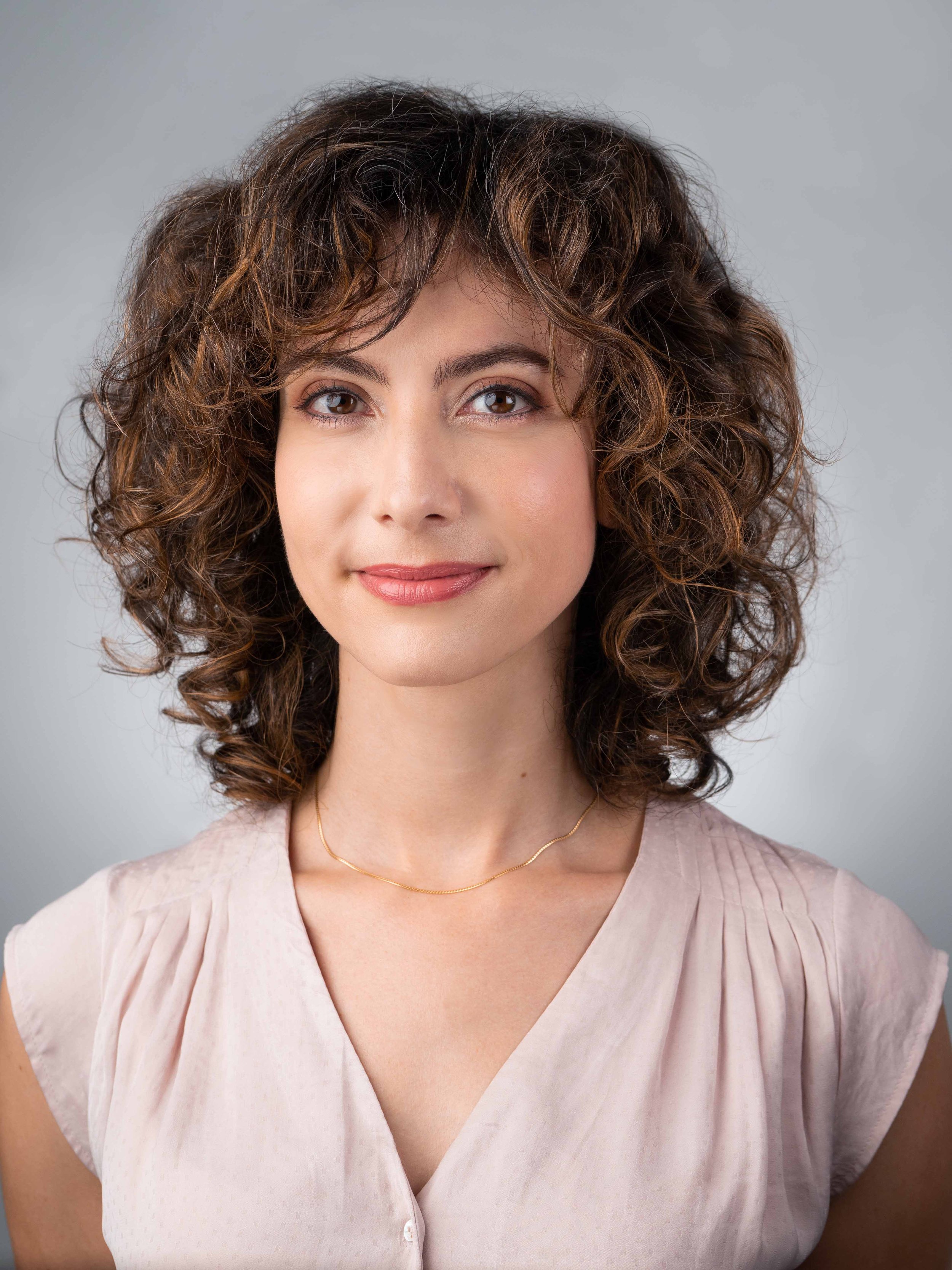 corporate headshot in Singapore of Alexandra Martinet, Linkedin, during a professional photo shoot at a photo studio near you