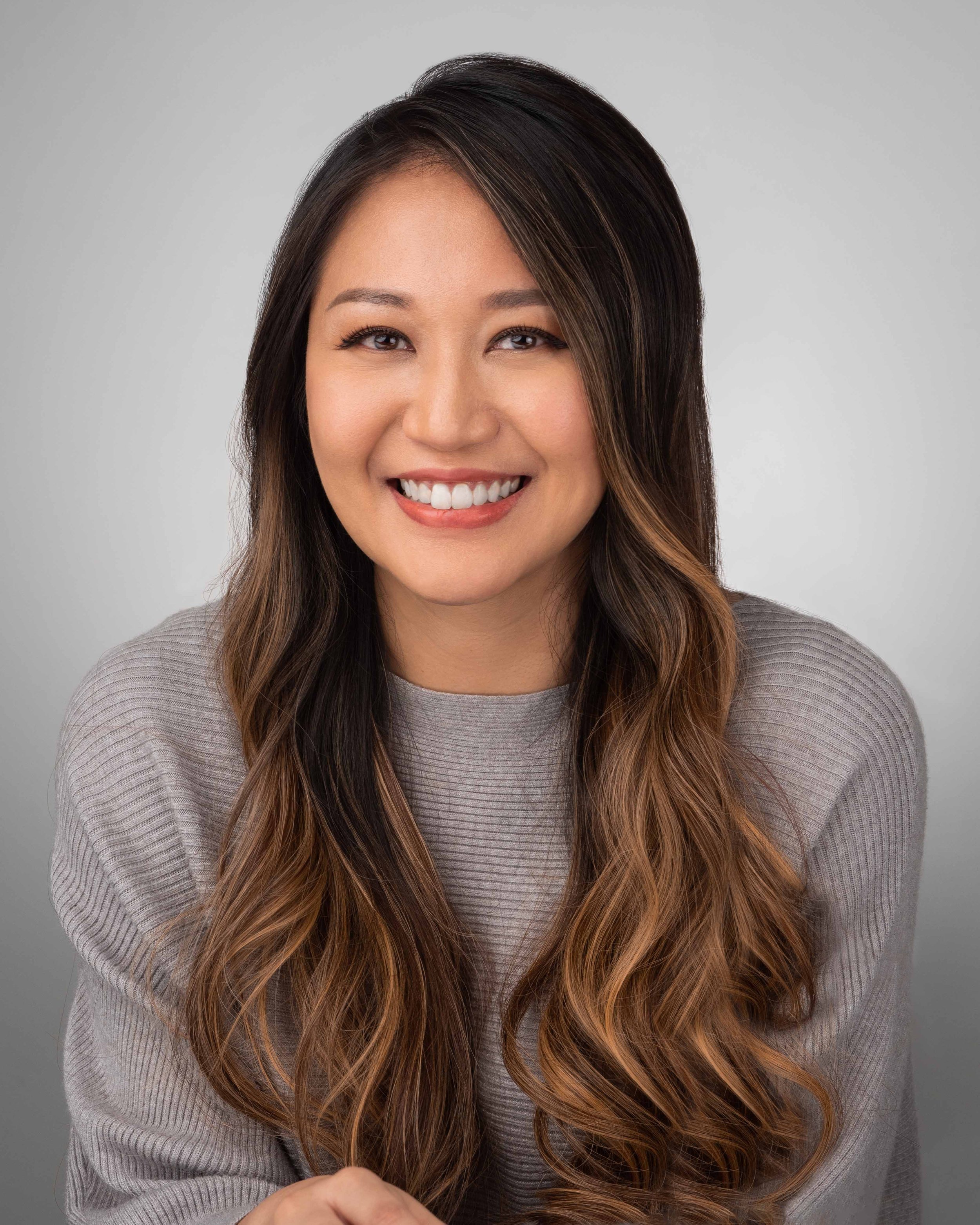 corporate headshot in Singapore of Anna Haotanto, Zora Health, during a professional photo shoot at a photo studio near you