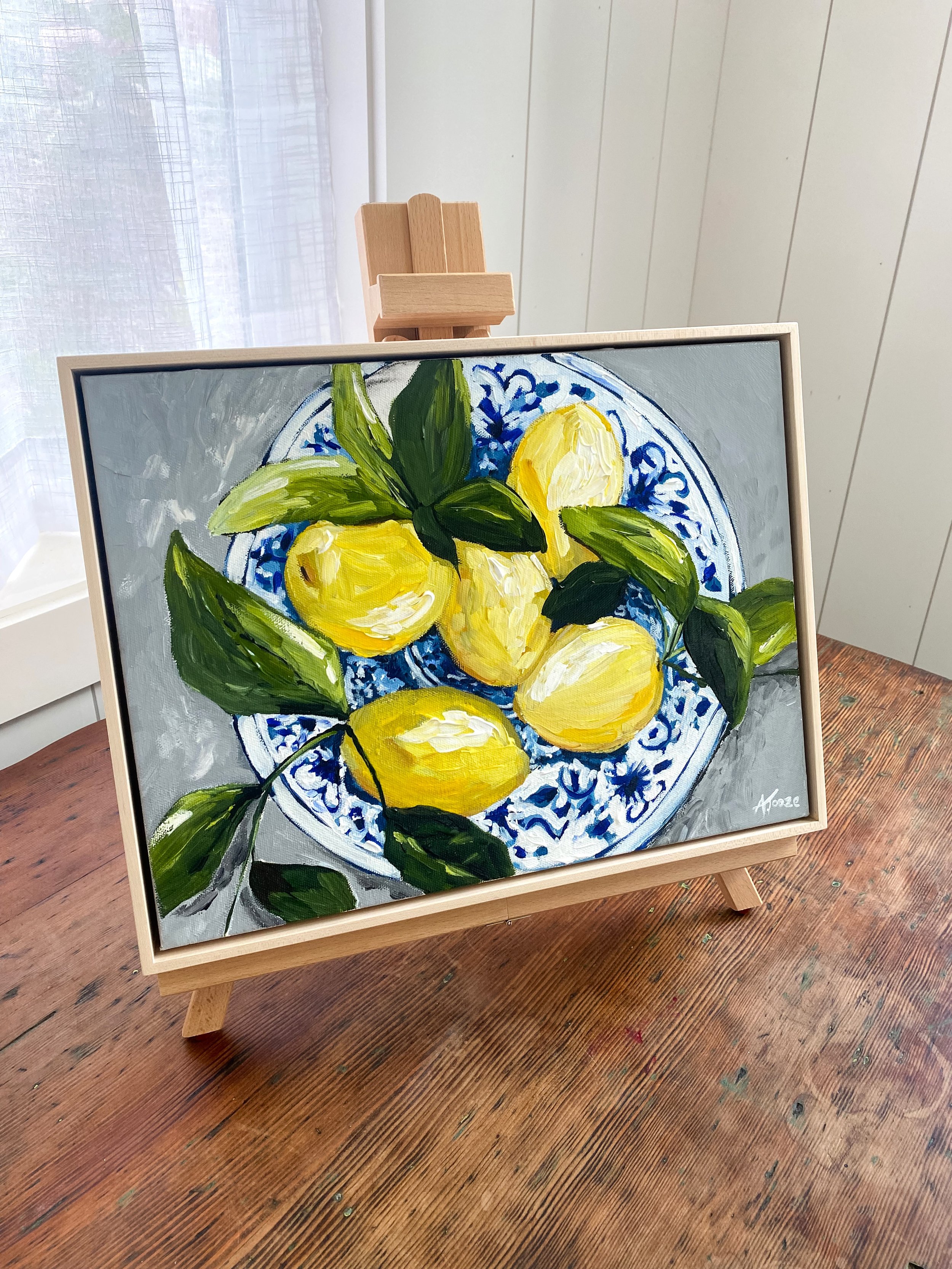 lemons in a blue and whit bowl on easle.jpeg