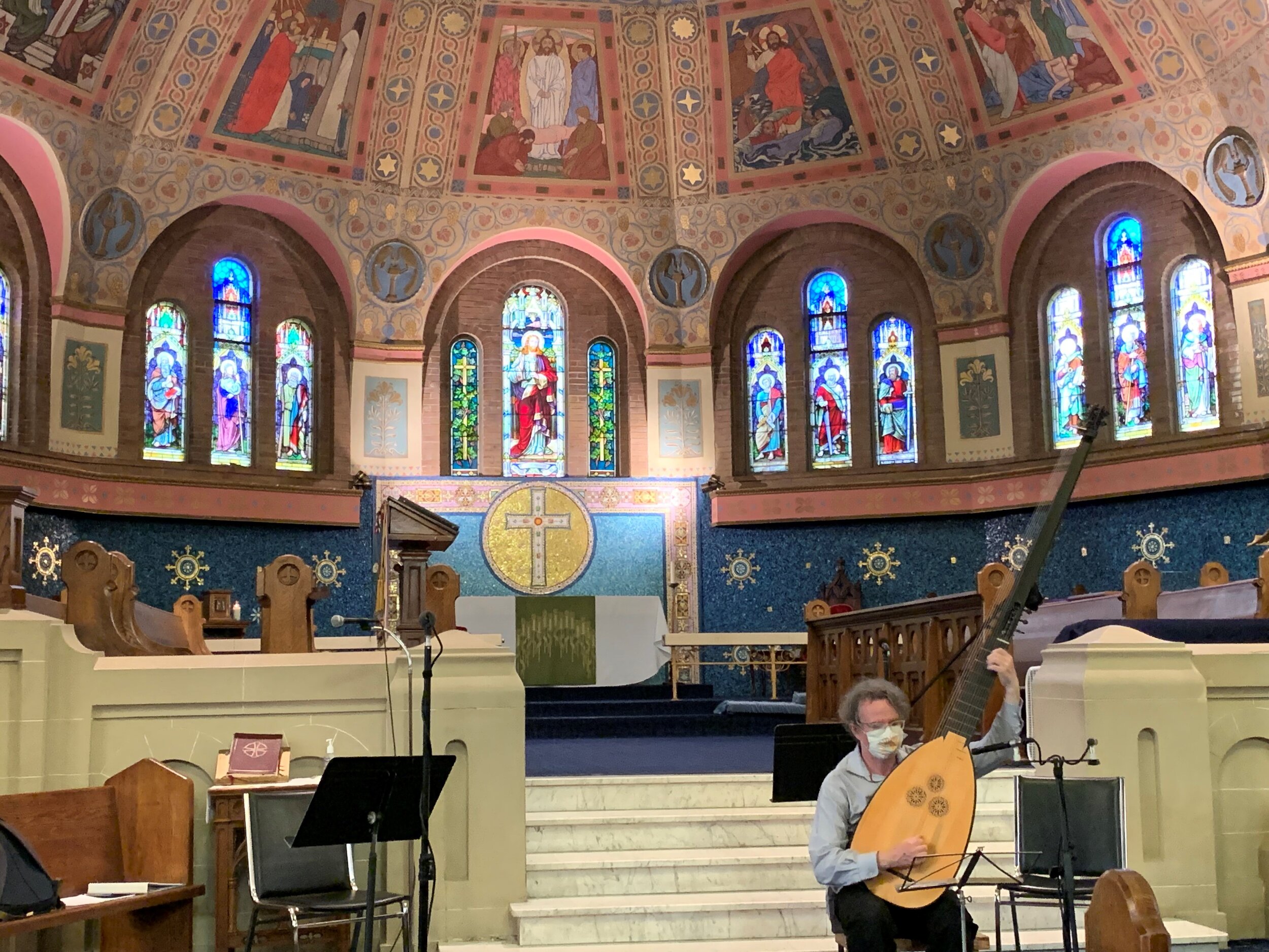 John Edwards plays theorbo during the Comus sessions at St. Anne’s Anglican Church, Toronto.