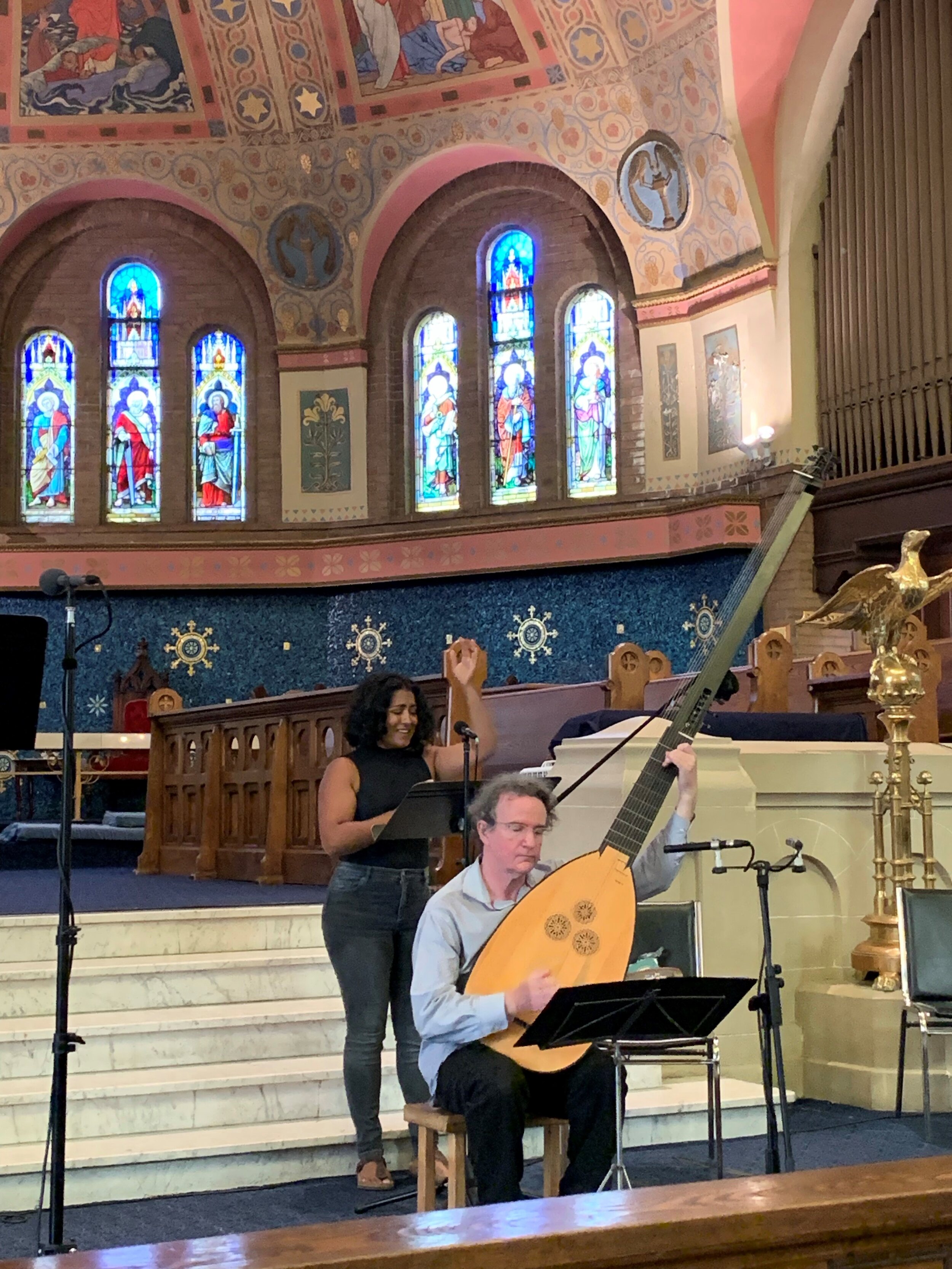 Tahirih Vejdani as Sabrina sings a song to announce her arrival to save the day.
