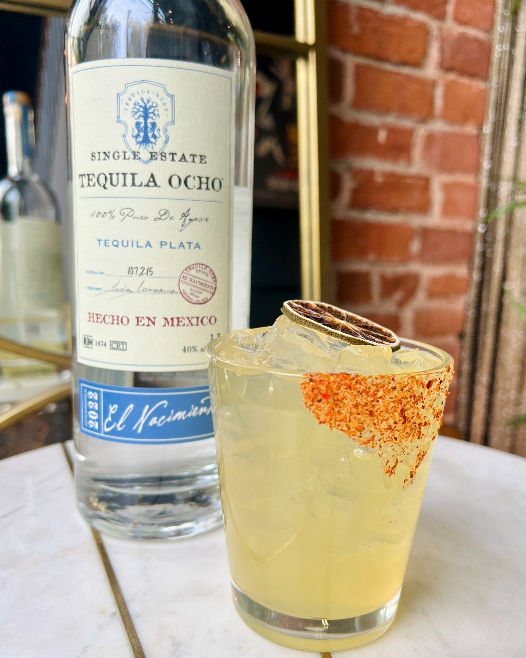 We blinked and it's almost May 🤯 We're not complaining though because that means we get to roll out a new Drink of the Month!

May's cocktail is a margarita made with Tequila Ocho, passionfruit syrup, lime juice, triple sec and a quarter taj&iacute;