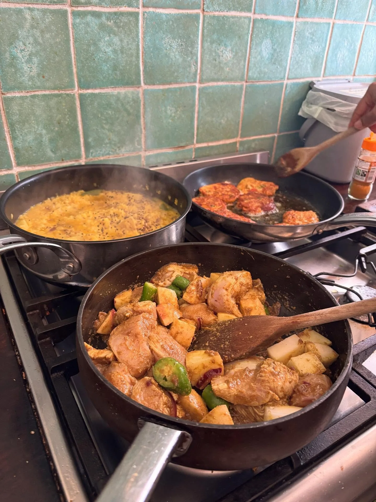 Combat Cooking October: Bangladesh 🇧🇩
This month&rsquo;s dish &mdash; Khichuri cooked with my friend Sadya &mdash; was a comforting mix of rice, lentils, and spices that fills Bengali homes; topped with courgette fritters. As we cooked, I learned  