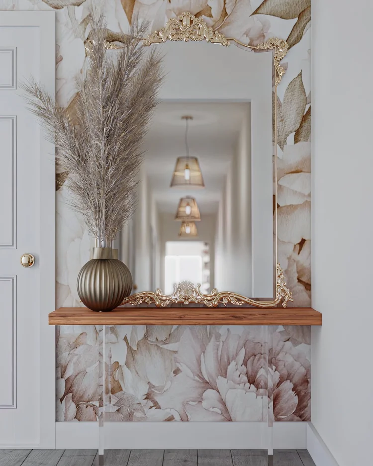 Floral wallpaper with a floating shelf, mirror and dried grasses
