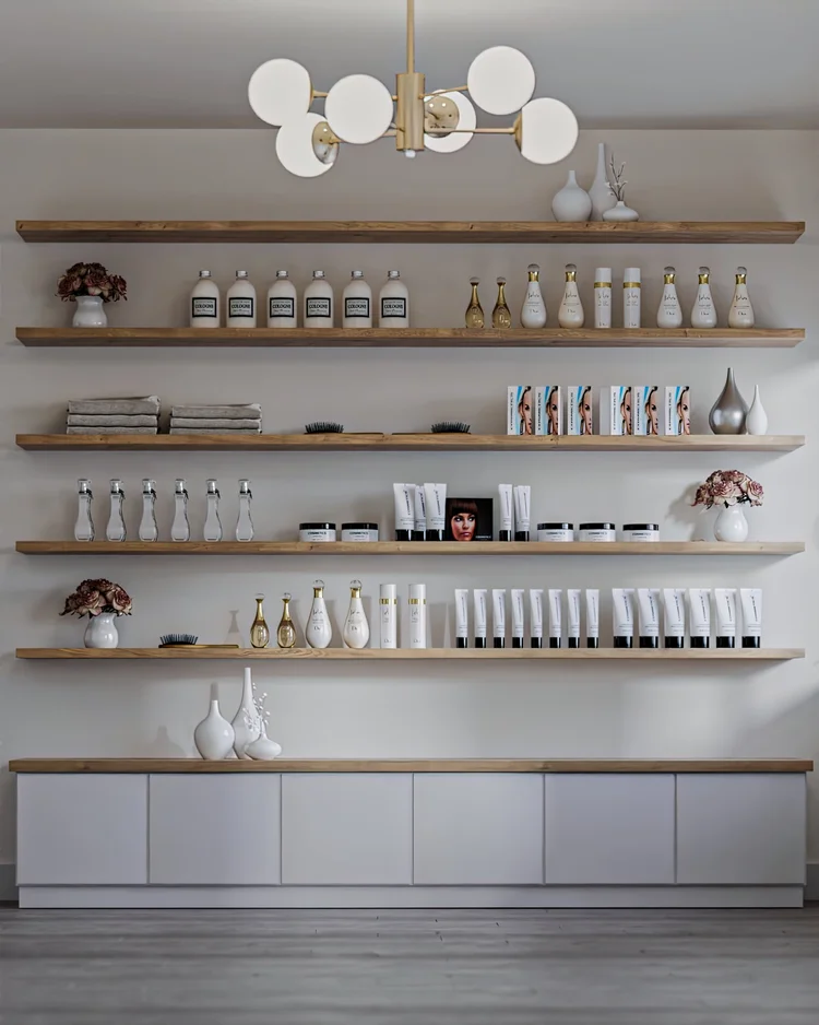 Styled open shelves with ceramics under a globe chandelier
