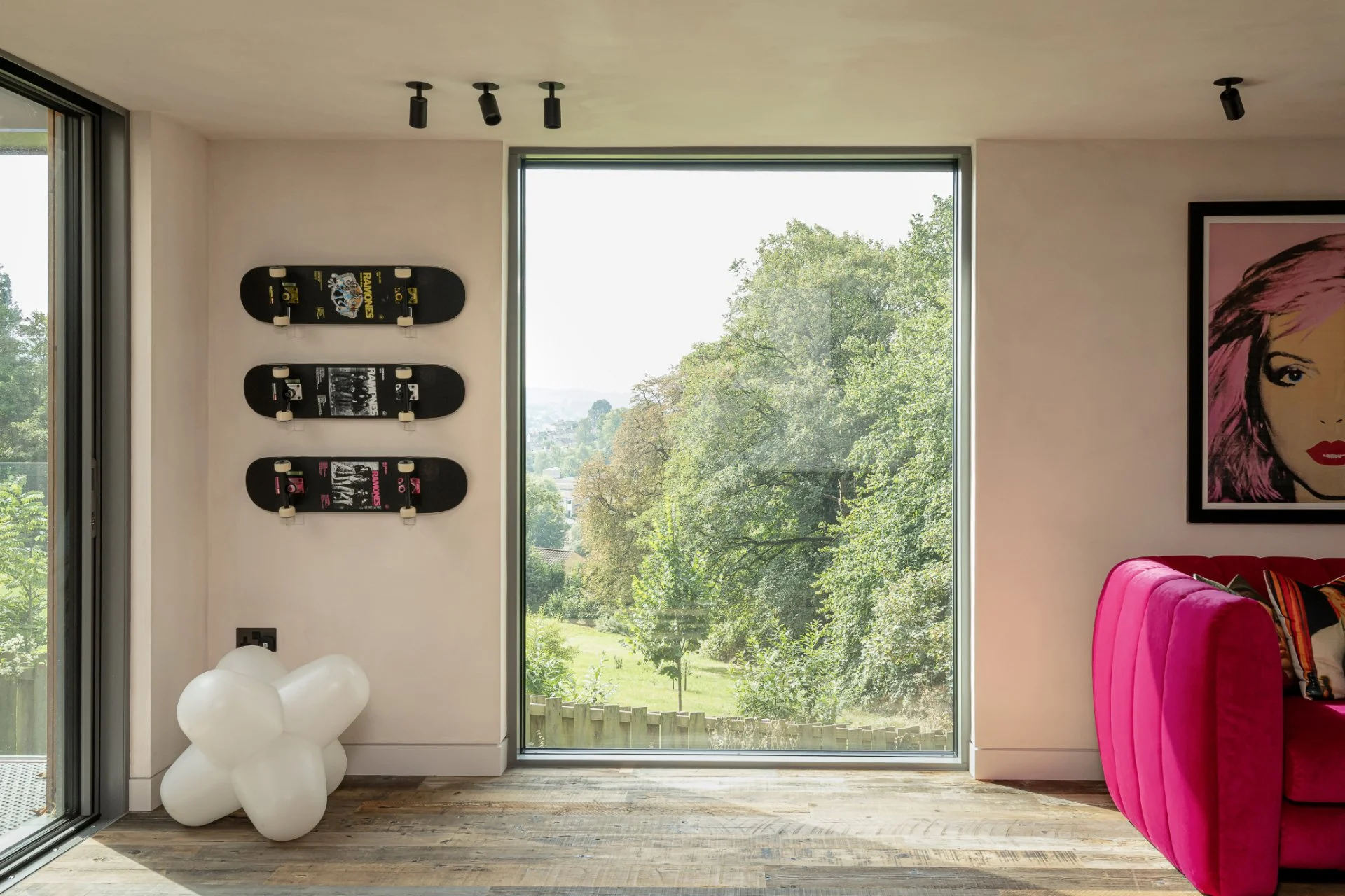 Windows frame views to bath hillside