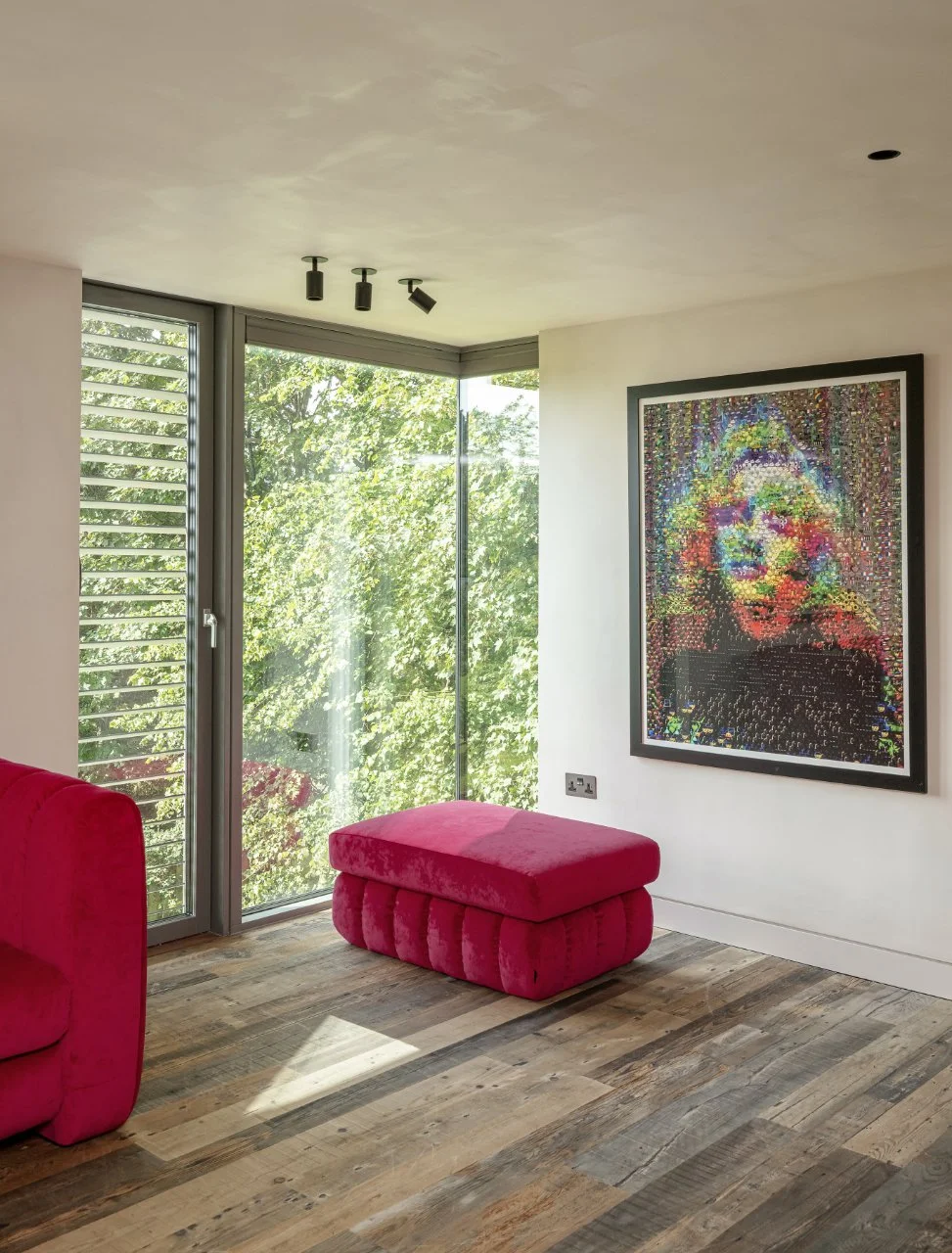 Windows frame views to bath hillside