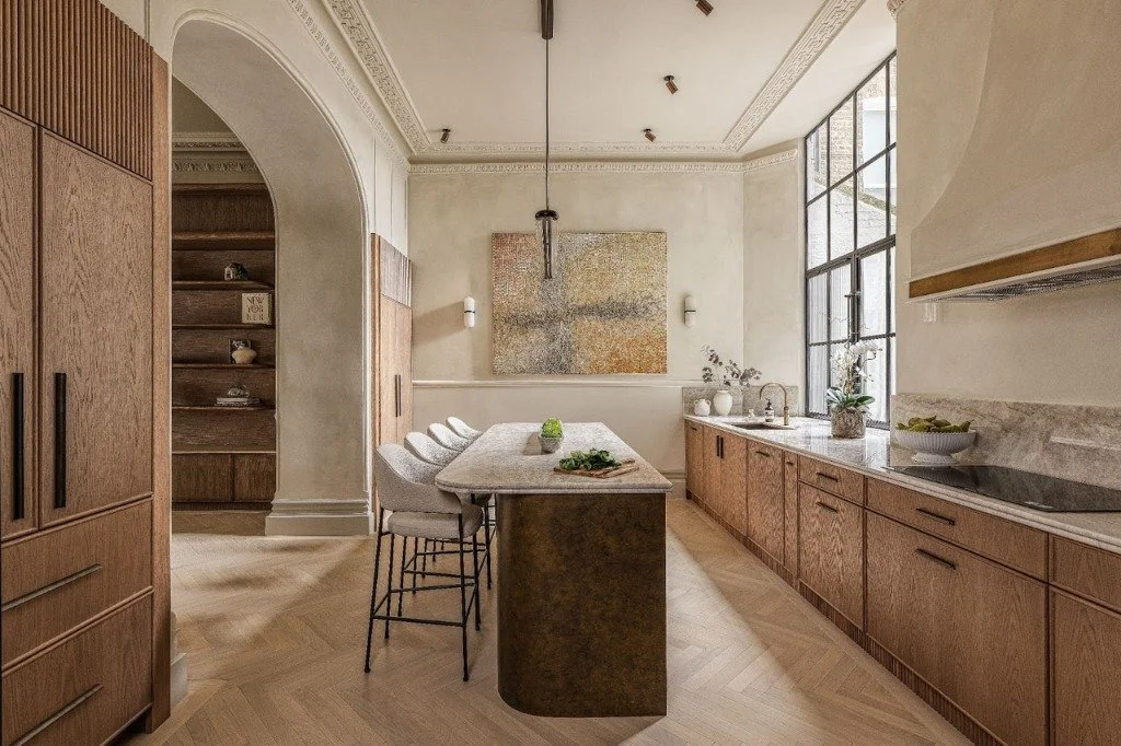 Crafted for a client who wanted a warm, welcoming home for family visits from the US, this kitchen is designed for slow mornings, lively gatherings, and the steady rhythm of holiday cooking. With the sink and hob placed along the same wall, the curve