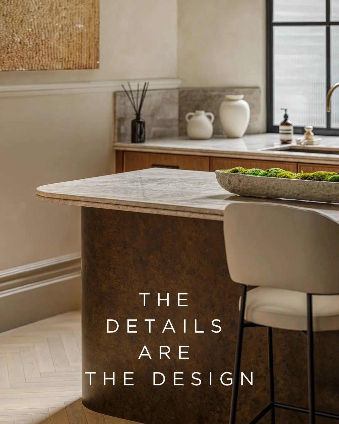 The details are the design.

The island sets the tone from the start. A curved liquid metal wrap in antique brass, finished by @watsonandgabb with a flat finish and hand-applied antique patina. No two are the same. It&rsquo;s the kind of detail that 
