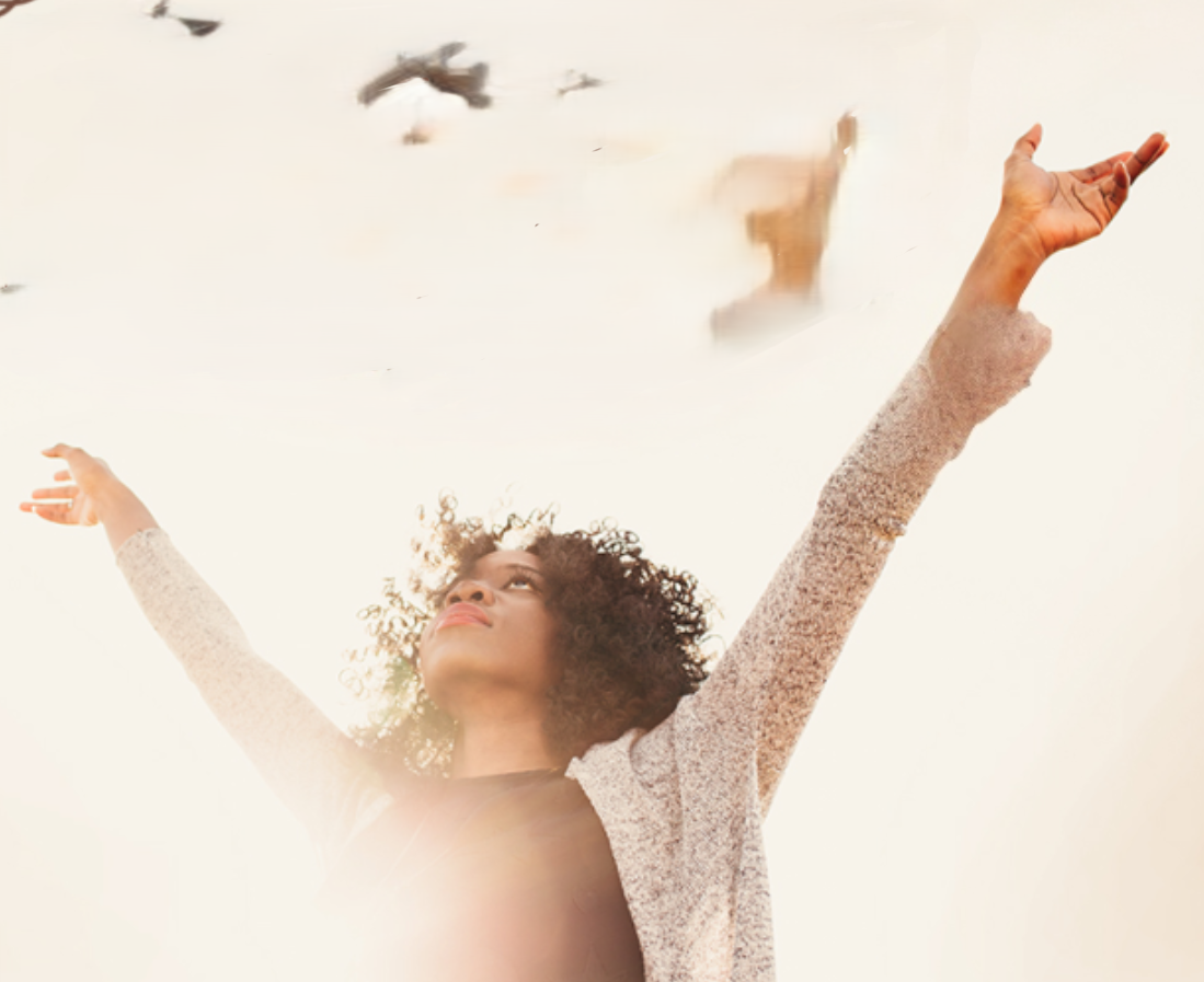 Pic of lady with hands up having clarity and a sense of liberating focus.