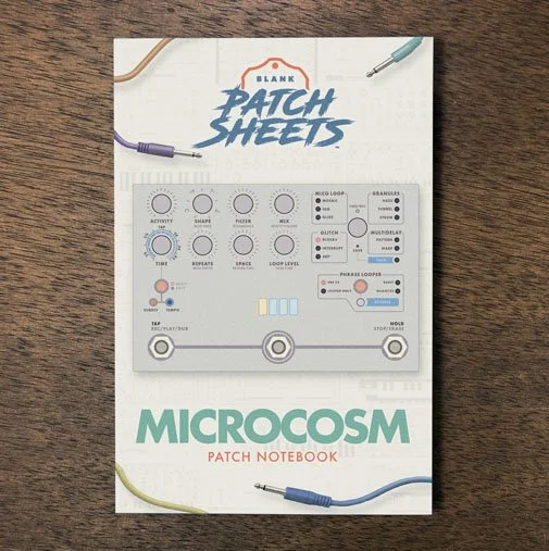 Hologram Microcosm Blank Patch Sheets Notebook on a dark wood desk