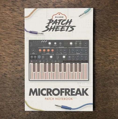 Arturia Microfreak Blank Patch Sheets Notebook on a dark wood desk