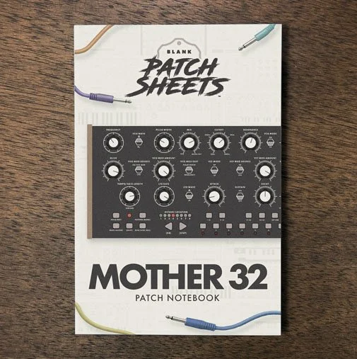 Moog Mother 32 Blank Patch Sheets Notebook on a dark wood desk