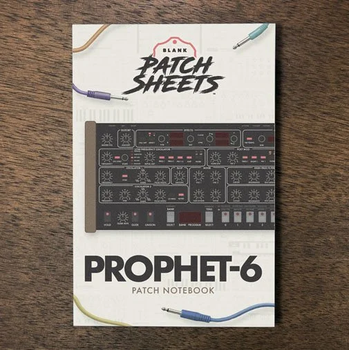 Sequential Prophet-6 Module Blank Patch Sheets Notebook on a dark wood desk