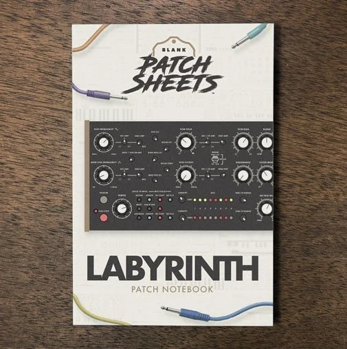 Moog Labyrinth Blank Patch Sheets Notebook on a dark wood desk