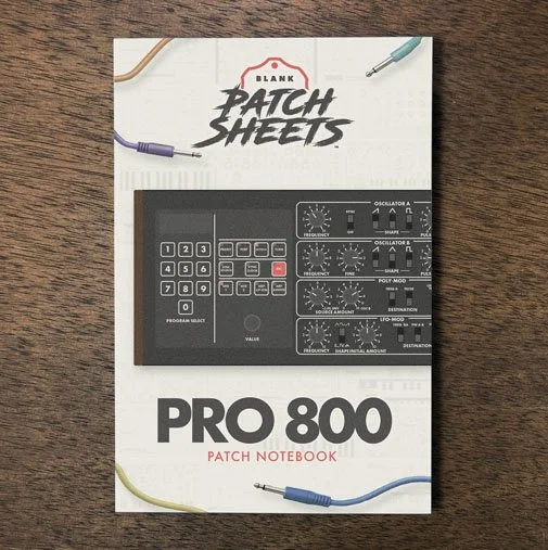 Behringer Pro 800 Blank Patch Sheets Notebook on a dark wood desk