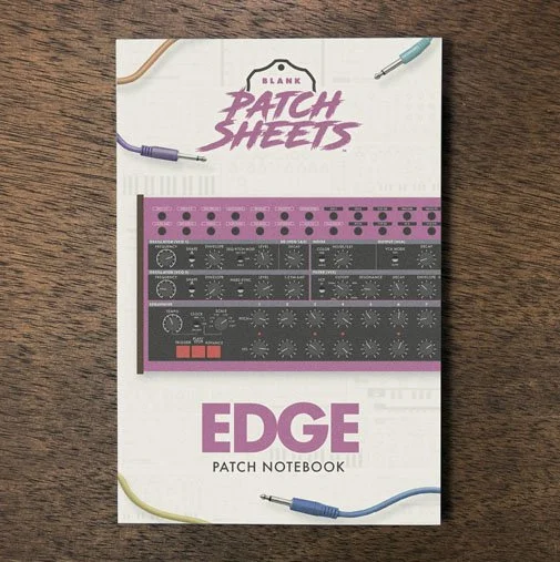 Behringer Edge Blank Patch Sheets Notebook on a dark wood desk