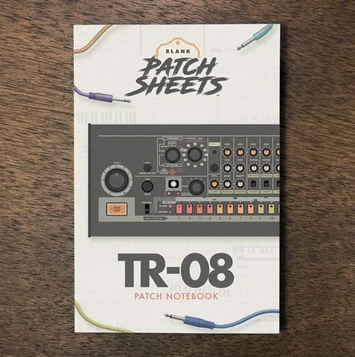 Roland TR-08 Blank Patch Sheets notebook on a dark wood Rdoelsaknd TR-08 Blank Patch Sheets notebook on a dark wood desk