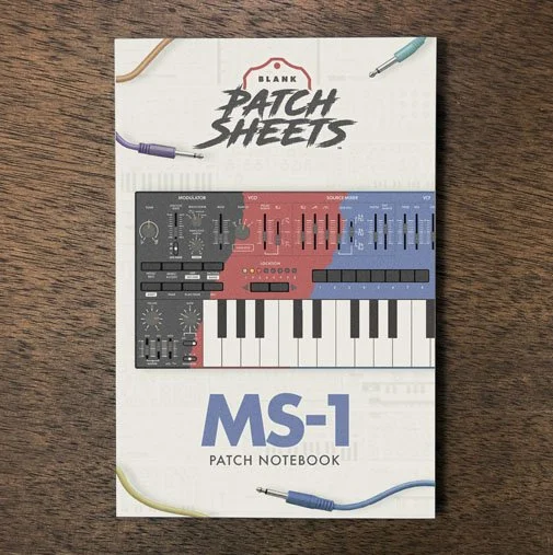 Behringer MS-1 Blank Patch Sheets Notebook on a dark wood desk