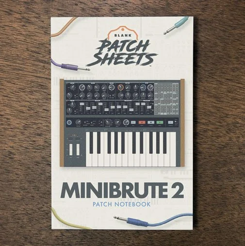 Arturia Minibrute 2 Blank Patch Sheets Notebook on a dark wood desk