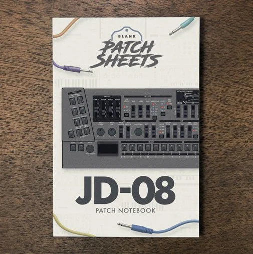 Roland JD-08 Blank Patch Sheets Notebook on a dark wood desk
