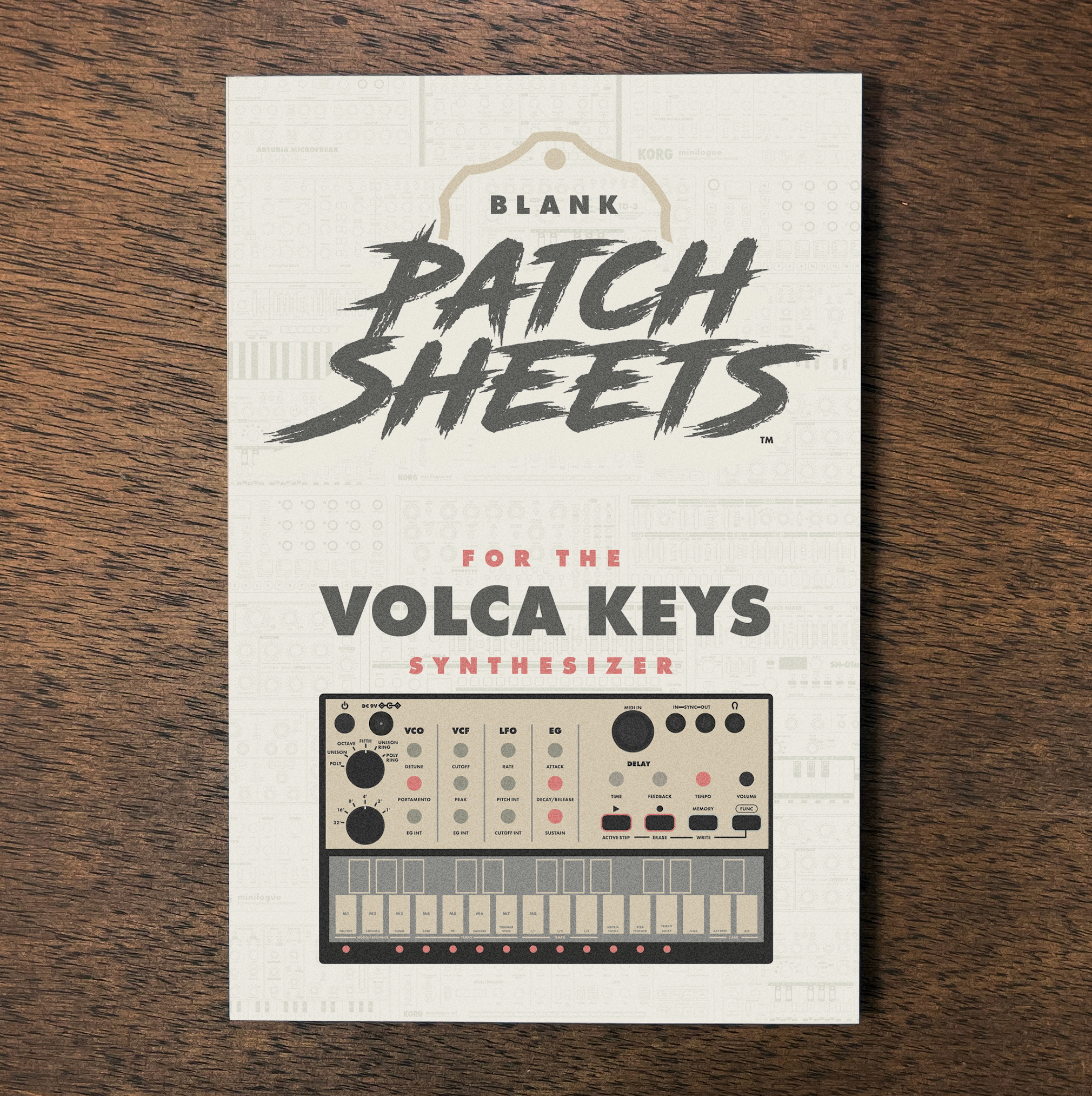 Book titled "Blank Patch Sheets for the Volca Keys Synthesizer" on a wooden surface.