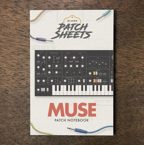 Moog Muse Blank Patch Sheets Notebook on a dark wood desk