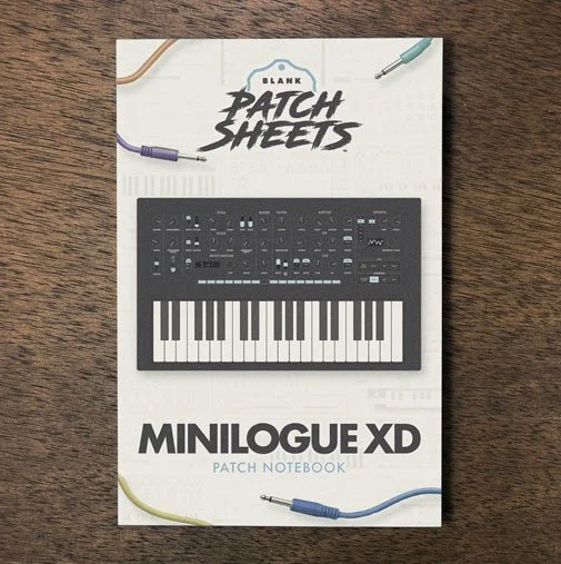 Korg Minilogue XD Blank Patch Sheets Notebook on a dark wood desk