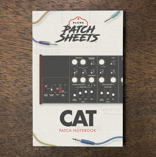 Behringer Cat Blank Patch Sheets Notebook on a dark wood desk