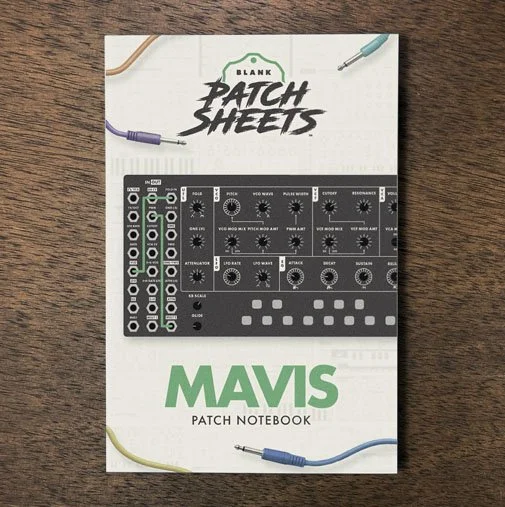 Moog Mavis Blank Patch Sheets Notebook on a dark wood desk