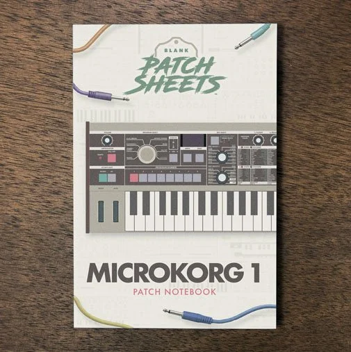 Korg Microkorg 1 Blank Patch Sheets Notebook on a dark wood desk