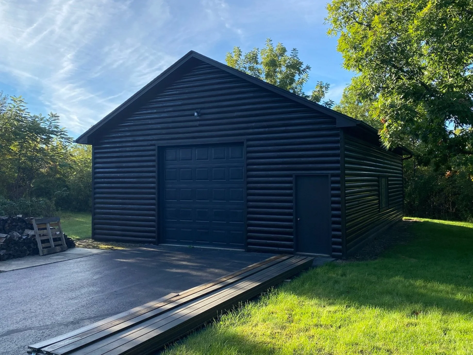 A Black House Showcasing JBC's Exterior Painting