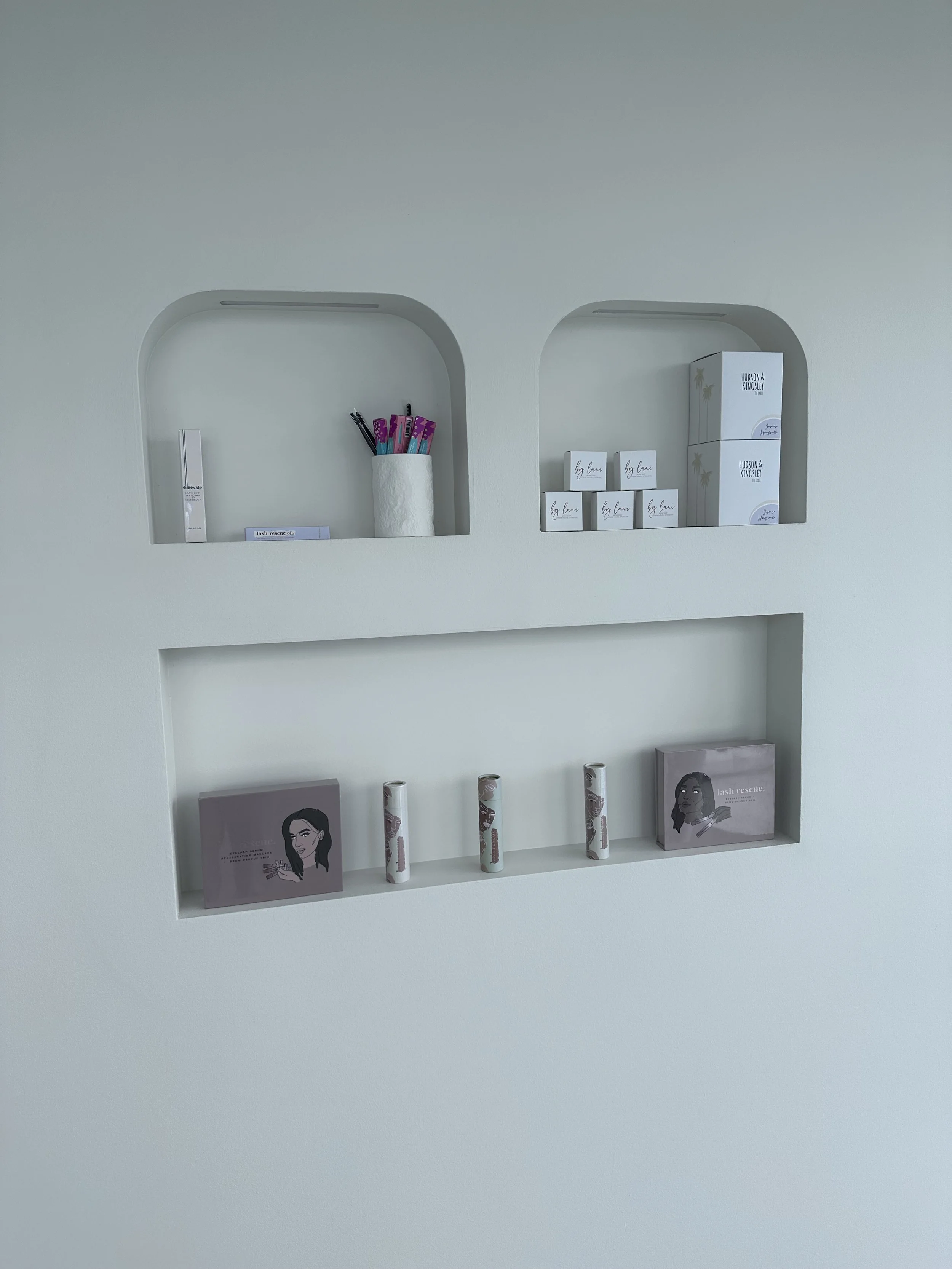 Minimal salon styling with natural textures and soft finishes