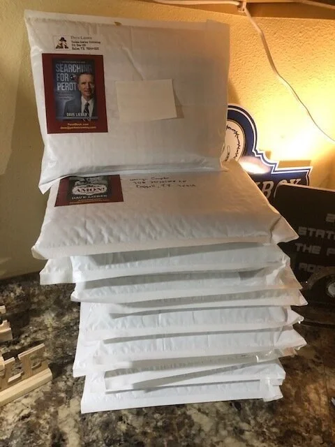 Perot book orders from a single day await a daily trip to the post office.
