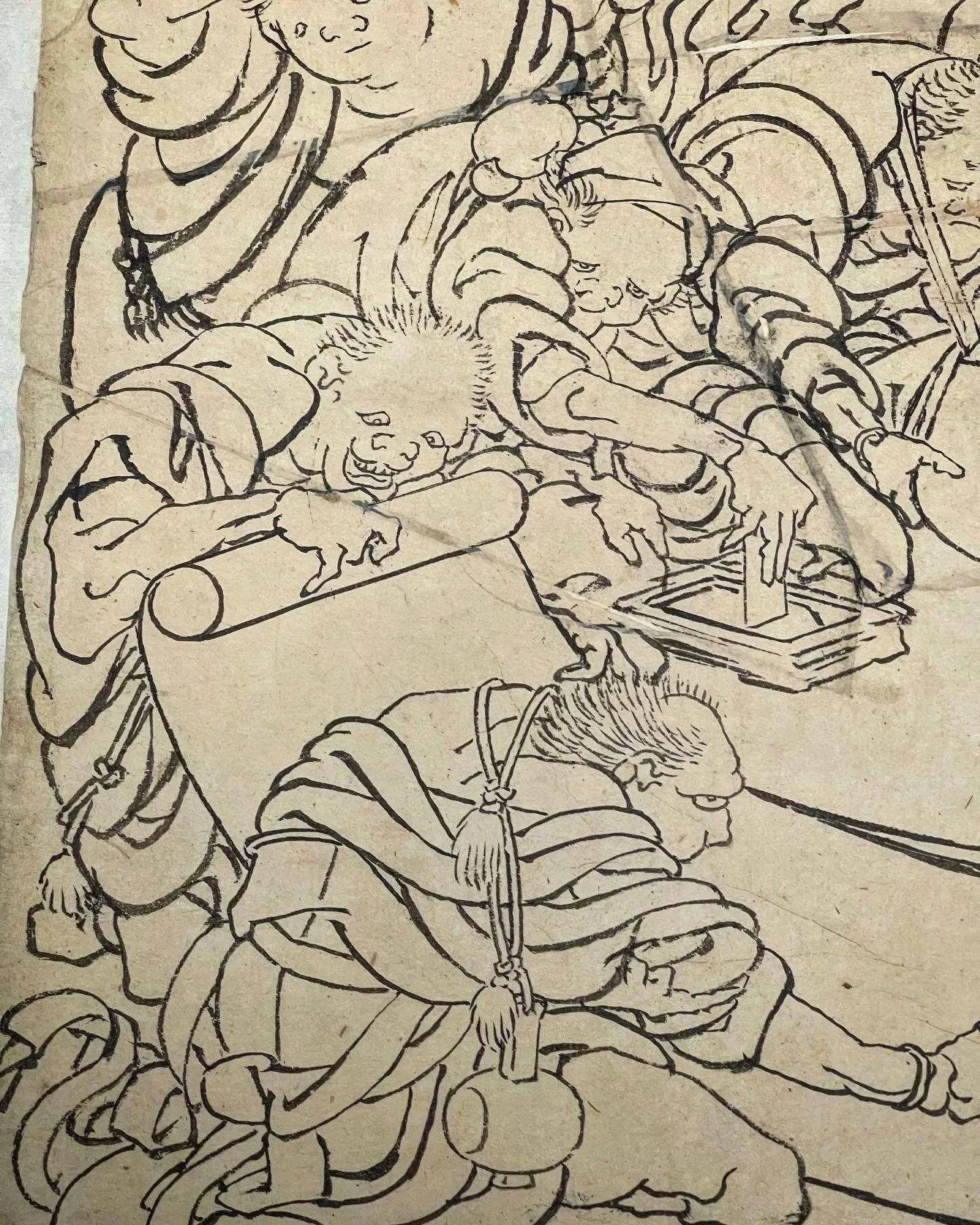 Hokusai: Groups of Twisted and Deformed Characters Gathered Around a Scroll. Preparatory Drawing ex Hayashi Collection.
.
Great Title! It seems to be priests and demons with some aged and sick.
.
#hokusai