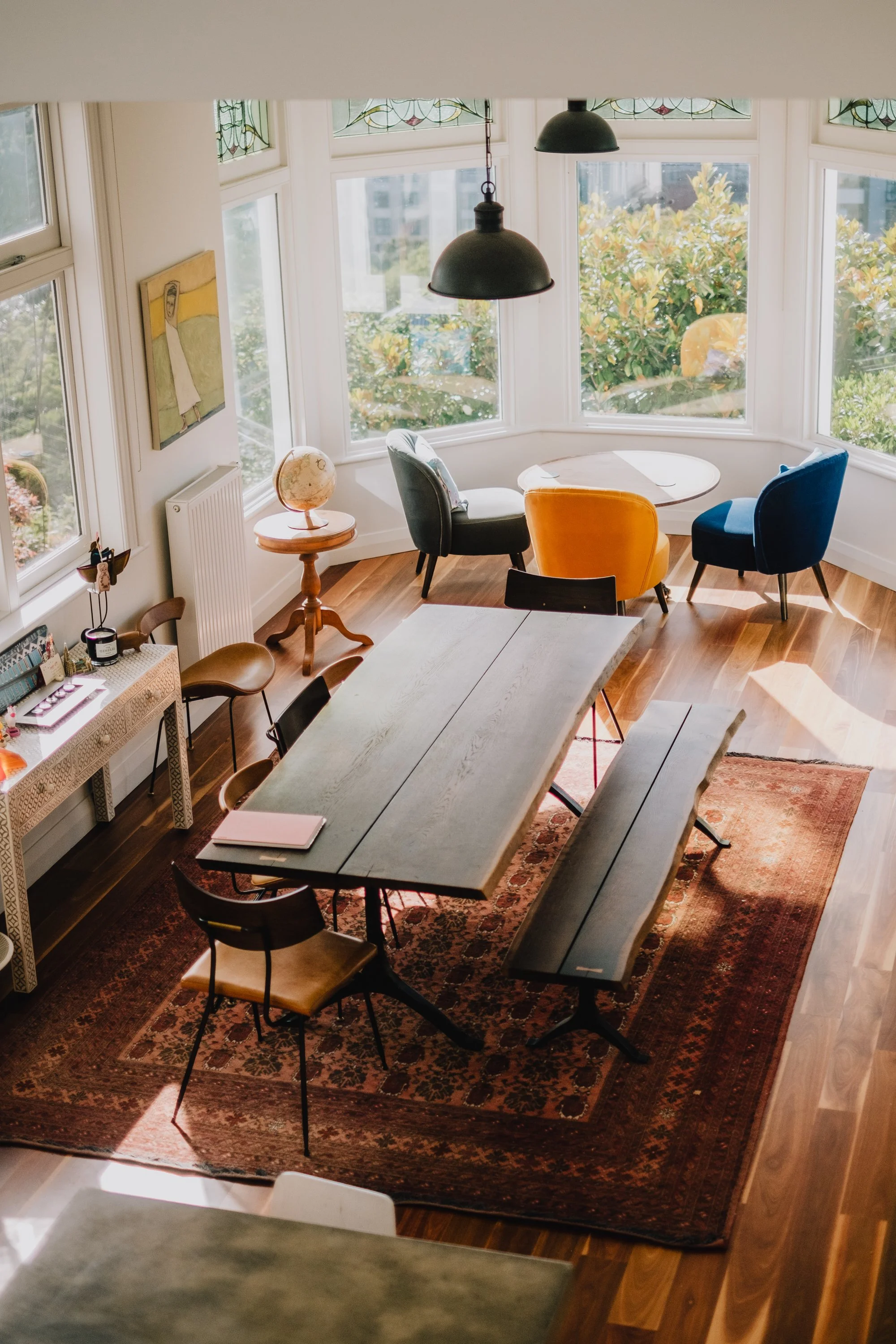 Modernised villa living room at Talavera Terrace in Wellington, blending heritage detailing with contemporary open living spaces and sustainable renovation design.