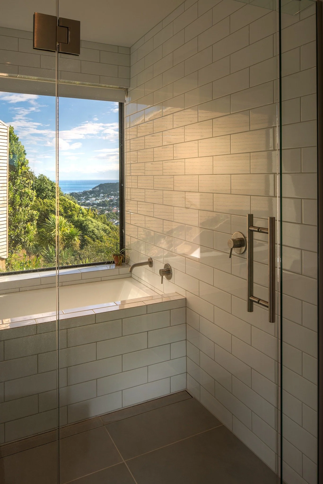 Buckley Road

The design response sympathetically marries a steep and exposed site with the needs of a growing, tight-knit family. Spaces for independence and varying degrees of togetherness meander their way down the 25-degree slope via a naturally 