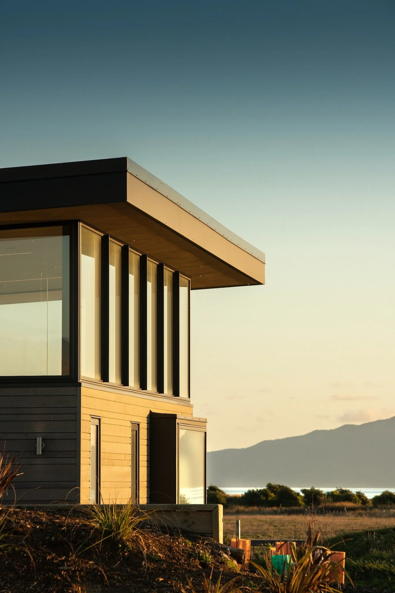 Te Horo Beach House

Silvery cladding references the driftwood piled upon the weathered coast, its orientation changing with the different activities within the home. The beach house is a luxurious retreat from city and corporate life, designed to be