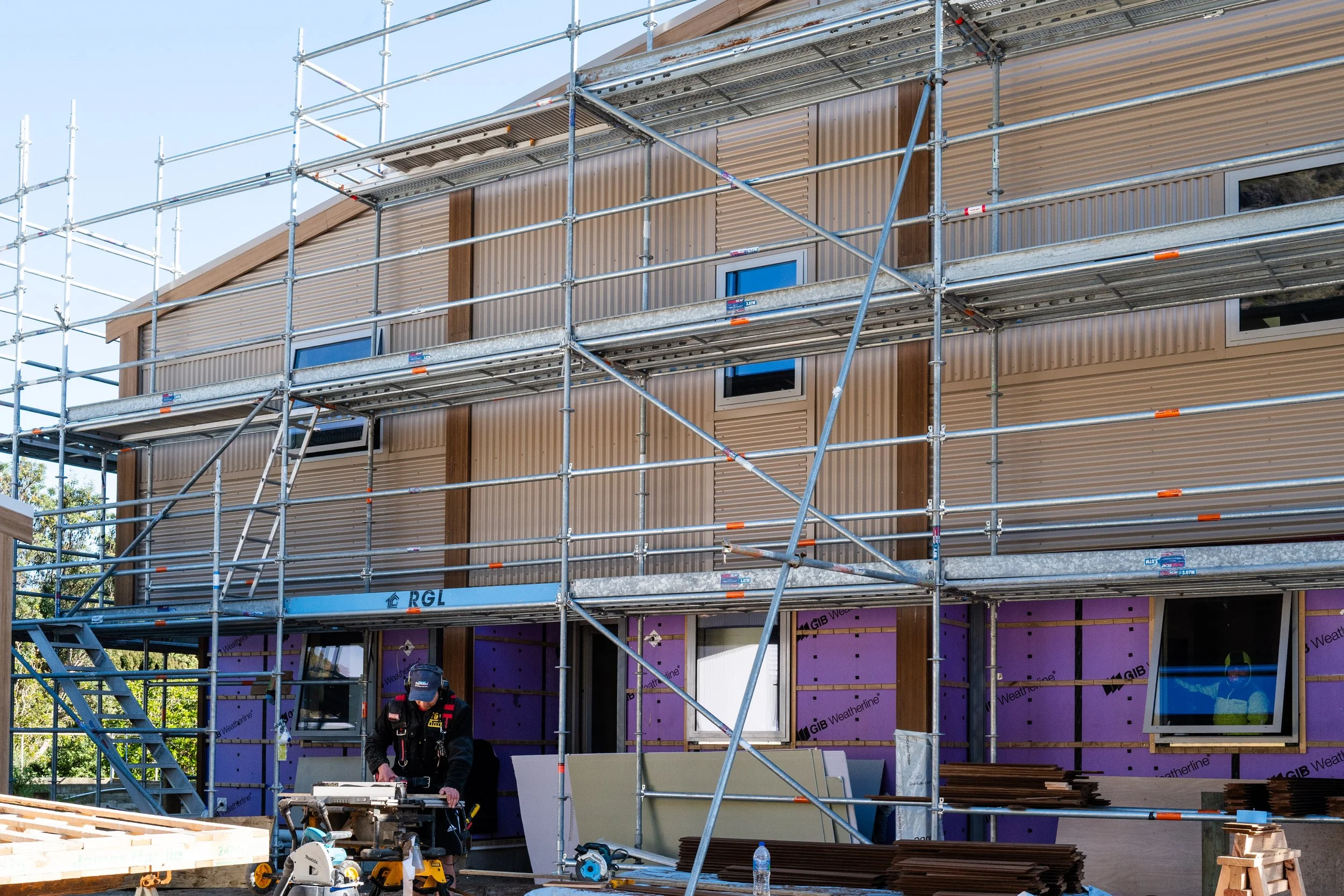 Beachroad Townhouses by First Light Studio, Townhouses in Paekākāriki corrugate facade under construction