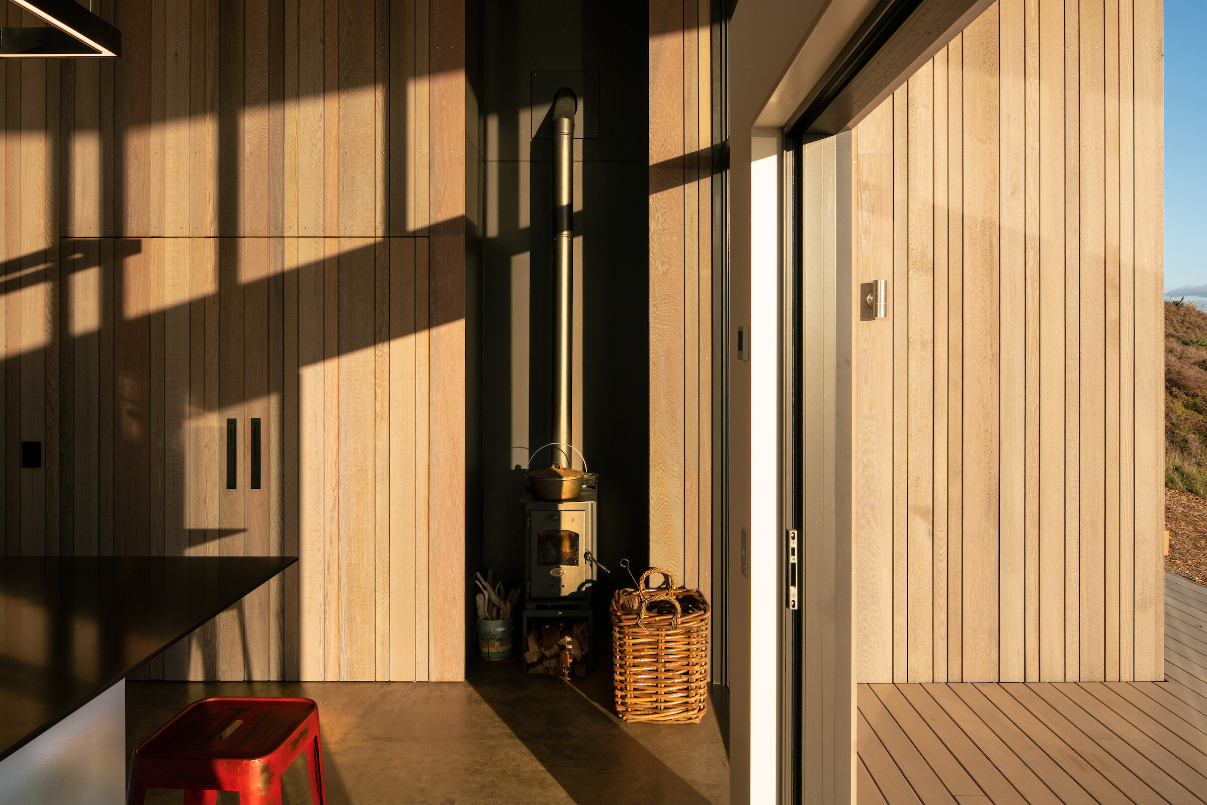 First Light Studio Te Horo Beach House open-plan living area with views towards Kapiti Island